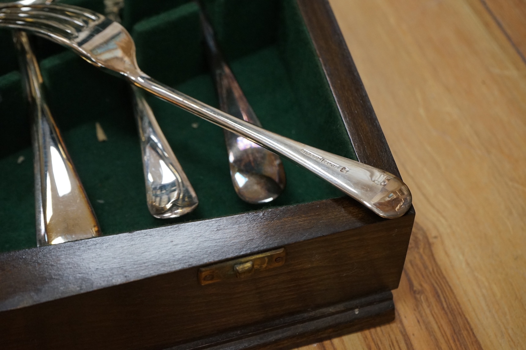 An oak canteen of silver plated cutlery
